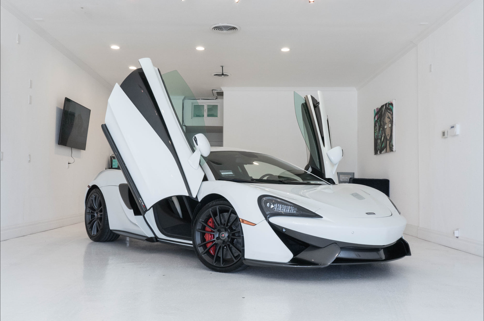 White McLaren at the Dipendable Guys shop